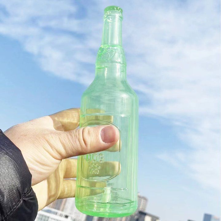 新款寵物發聲耐咬解悶磨牙漂浮橡膠TPR網球酒瓶大狗小狗益智玩具