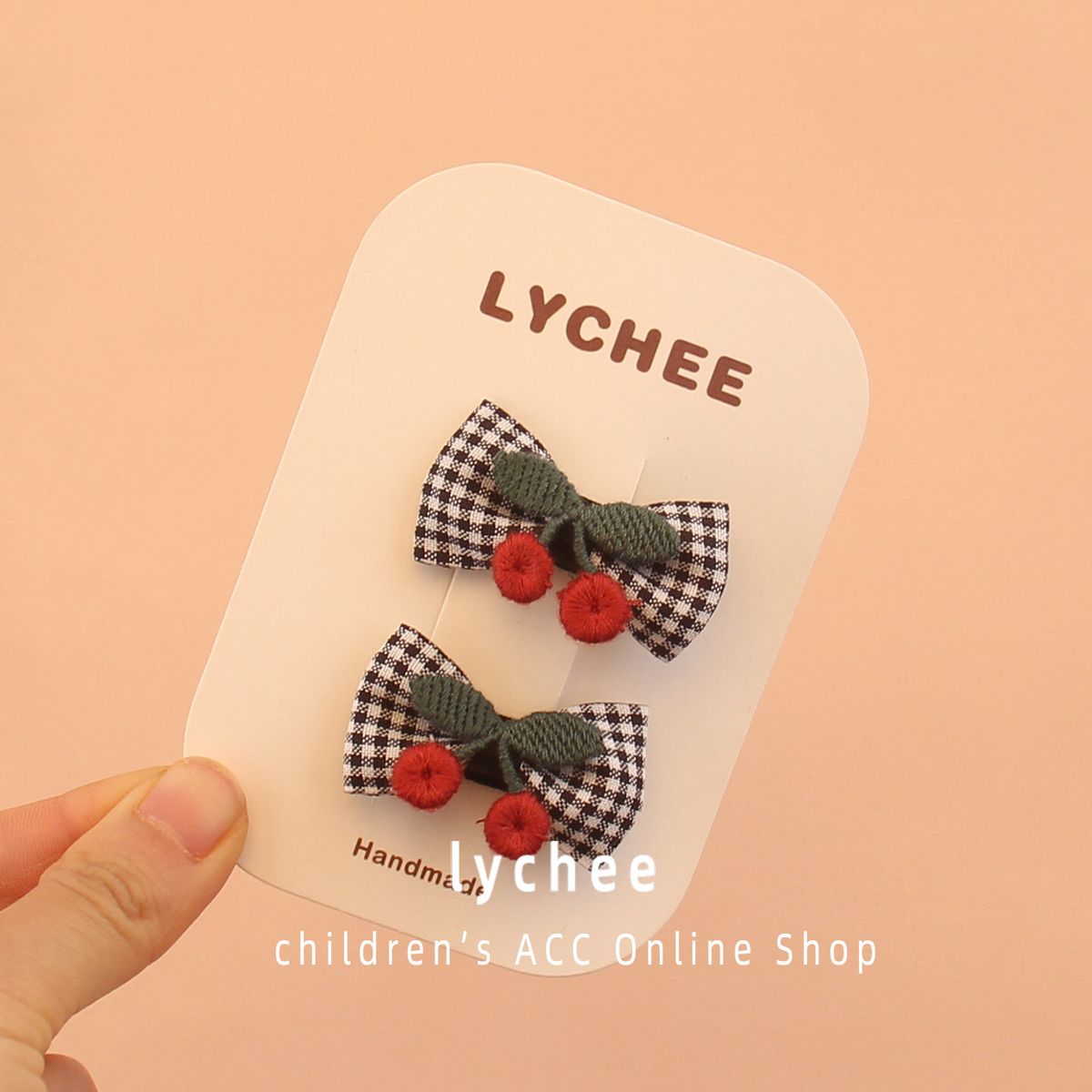 A pair of checkered cherry bow children's BB clips, black and white small checkered satin ribbons, t