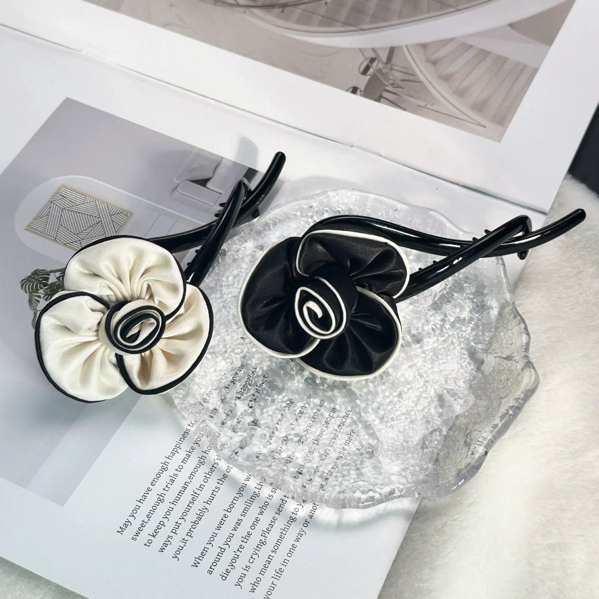 The camellia-inspired hair bun features a retro