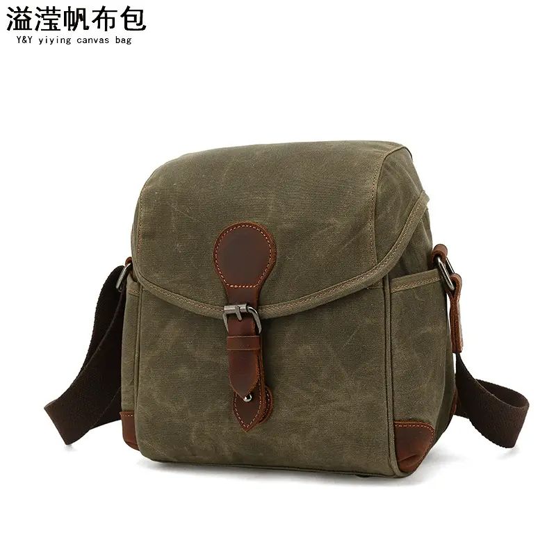 广州厂家复古帆布单肩包防水相机男包真皮斜挎摄像包手提包