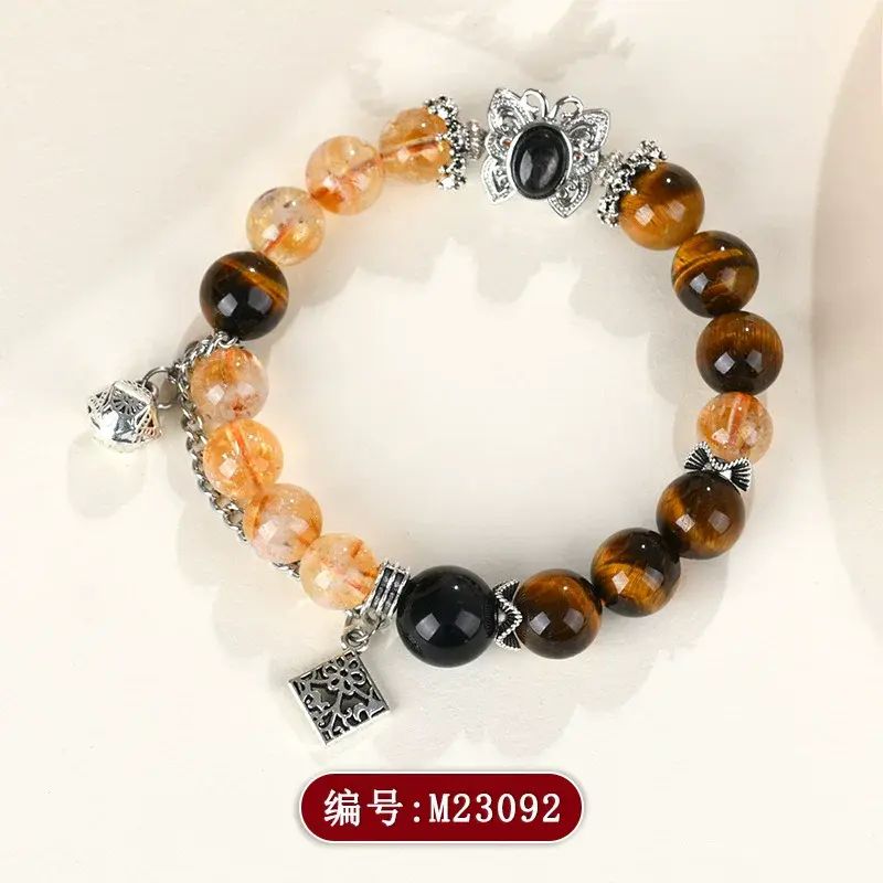 Natural crystal yellow pagoda crystal tiger eye stone micro-inlaid butterfly bracelet fashion origi